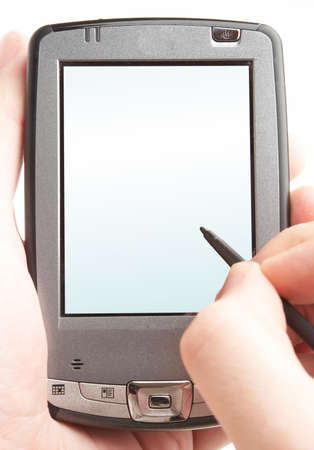 Pocket computer in a hand. With the schedule on the screen on a white backgroundの写真素材