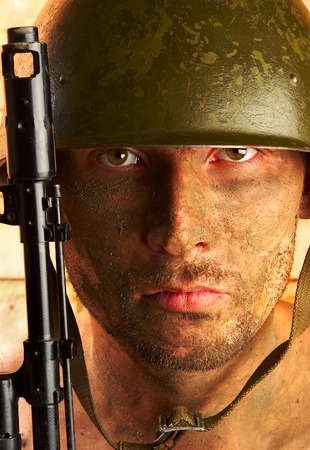 The soldier in a military helmet の写真素材