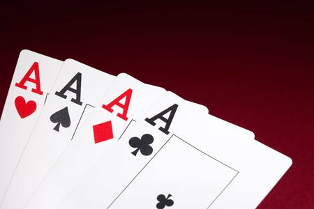 Pockets Aces with plenty of red background for textcopy