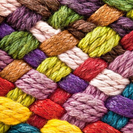 image of braided multi colored woollen yarns