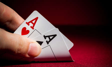 Pockets Aces with plenty of red background for textcopy
