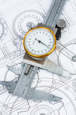 Metal vernier caliper on technical drawingの写真素材