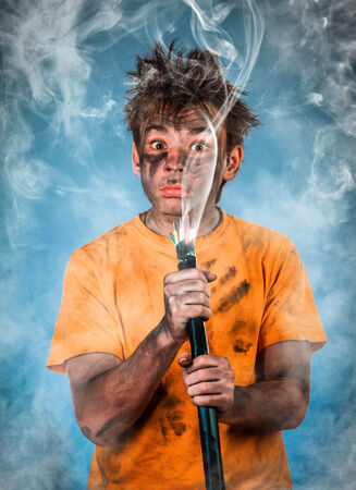 Boy has a electric shockの写真素材