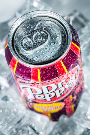 MOSCOW, RUSSIA-APRIL 4, 2014: Can of Dr Pepper Cherry Vanilla soft drink on ice. Dr Pepper is a soft drink marketed as having a unique flavor. The drink was created in the 1880s.のeditorial素材