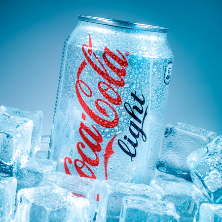 MOSCOW, RUSSIA-APRIL 4, 2014: Can of Coca-Cola Lignt on ice. Coca-Cola is a carbonated soft drink sold in stores, restaurants, and vending machines throughout the world.のeditorial素材