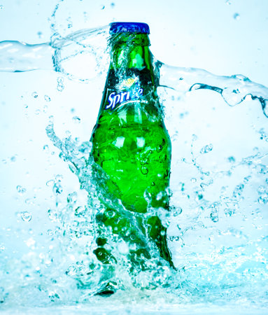 MOSCOW, RUSSIA-APRIL 4, 2014: Bottle of Coca Cola company soft drink Sprite in water. It was introduced in the United States in 1961. This was Coke's response to the popularity of 7 Up.のeditorial素材