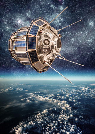 Space satellite orbiting the earth. の写真素材