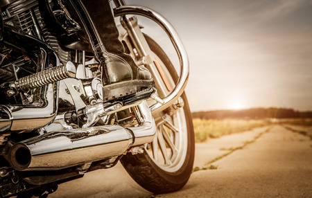 Biker girl riding on a motorcycle. の写真素材