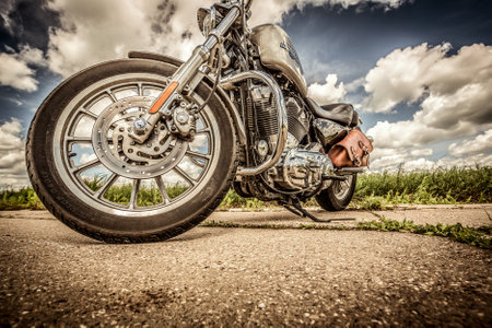 RUSSIA-JULY 7, 2013: Harley-Davidson Sportster 883 Low. Harley-Davidson sustains a large brand community which keeps active through clubs, events, and a museum. Filter applied in post-production.のeditorial素材
