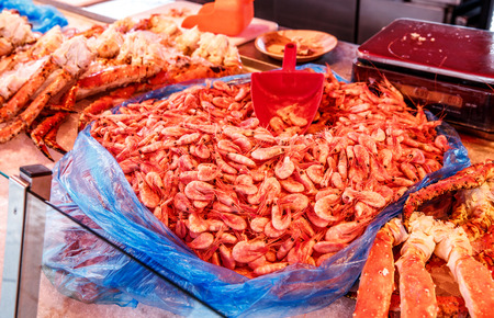 Various seafood on the shelves of the fish market in Norway, Bergenの写真素材