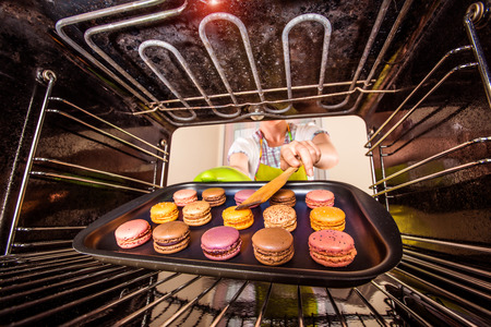 Baking macarons in the oven view from the inside of the oven. Cooking in the oven.の写真素材