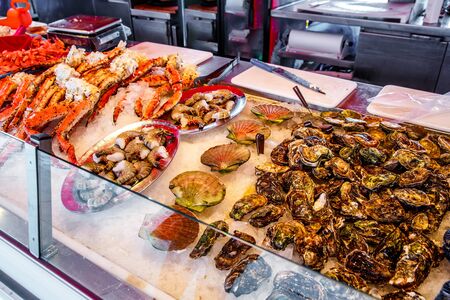 Various seafood on the shelves of the fish market in Norway, Bergenの写真素材