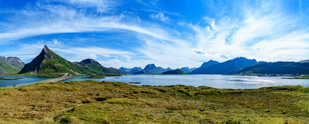 Lofoten is an archipelago in the county of Nordland, Norway. Is known for a distinctive scenery with dramatic mountains and peaks, open sea and sheltered bays, beaches and untouched lands.の写真素材