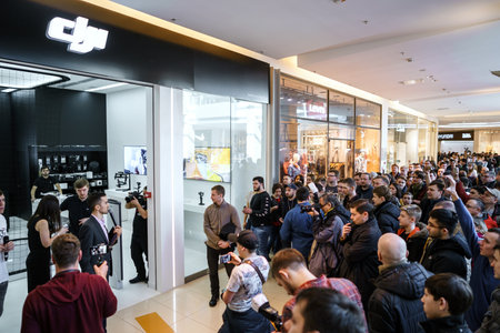 MOSCOW RUSSIA:01 APR 2017 - DJI Quadcopter Drone store opening ceremony in Moscow. DJI is the leading company in the civilian-drone industry. It manufactures also gimbals, cameras, camera stabilizers.のeditorial素材