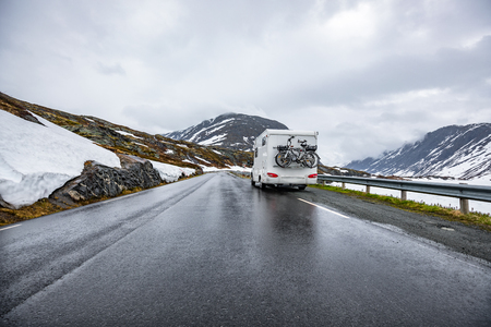 Caravan car travels on the highway. Tourism vacation and traveling.の写真素材