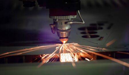 CNC Laser cutting of metal modern industrial technology.