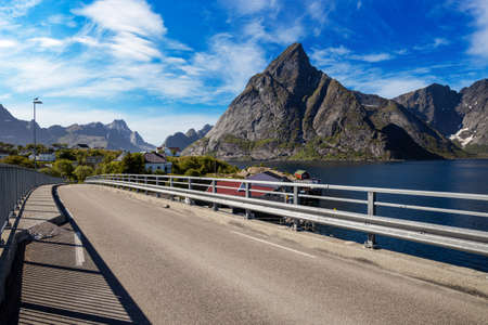 Lofoten is an archipelago panorama in the county of Nordland, Norway. Is known for a distinctive scenery with dramatic mountains and peaks, open sea and sheltered bays, beaches and untouched lands.の写真素材