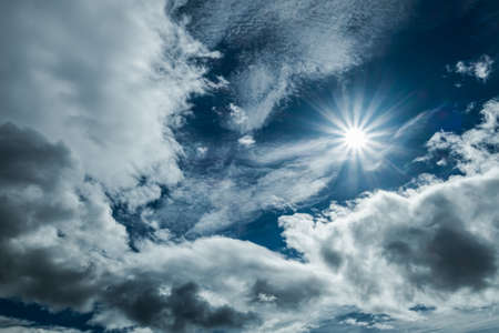 Sun in blue sky background