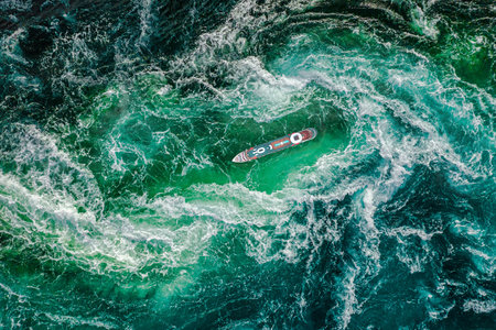 Storm waves of the sea around the ship.の写真素材