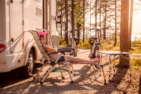 Family vacation travel RV, holiday trip in motorhome, Caravan car Vacation.の写真素材