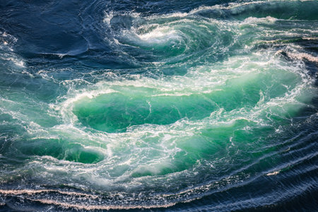 Blue waves of water of the river and the sea meet each other during high tide and low tide....