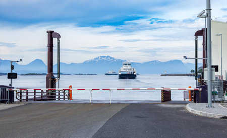 Car ferry crossing Fjord in Norway.の写真素材