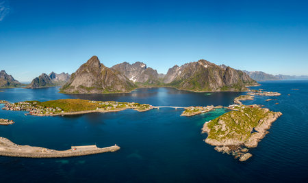 Panorama Lofoten is an archipelago in the county of Nordland, Norway. Is known for a distinctive scenery with dramatic mountains and peaks, open sea and sheltered bays, beaches and untouched lands.の写真素材