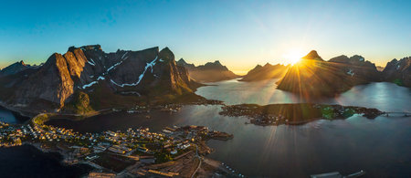 Panorama Lofoten is an archipelago in the county of Nordland, Norway. Is known for a distinctive scenery with dramatic mountains and peaks, open sea and sheltered bays, beaches and untouched lands.の写真素材