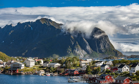 Amazing landscape town of Reine of the Lofoten Islands with blue sky, county of Nordland, Norway.の写真素材