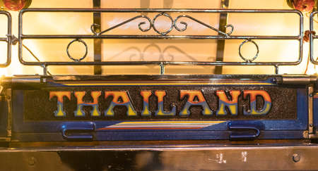Car tag of Tuk-Tuk native taxi in Thailand. This is a symbol of the taxi in Bangkok city. This symbol of the old patterns of ancient Thailand.の写真素材
