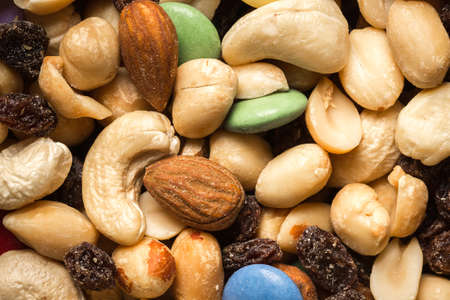 Pile of trailmix (nuts, raisins and candy)