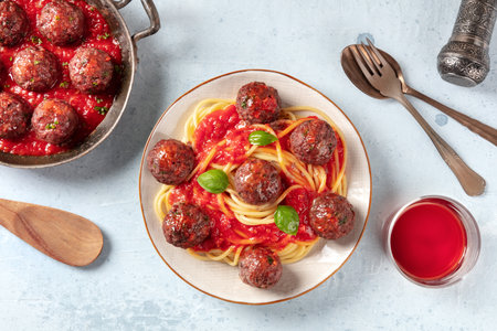 Meatballs with pasta and tomato sauce, overhead flat lay shotの写真素材