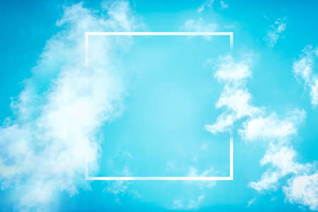 Blue sky with white clouds and a square frame for copy spaceの写真素材