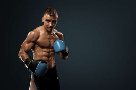 Boxing on studio. Sportsmen boxing with gloves on studio.のeditorial素材