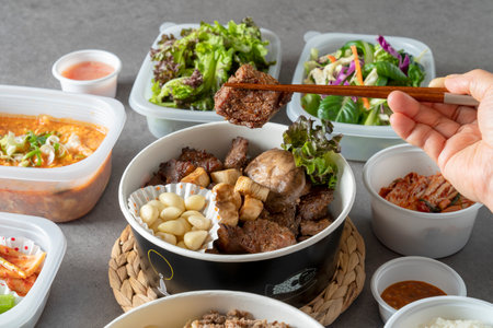 Korean food, ribs, gondre, bulgogi, cup rice, rice, vegetables, side dishes, lettuce, kimchi, soybean paste, garlicの写真素材