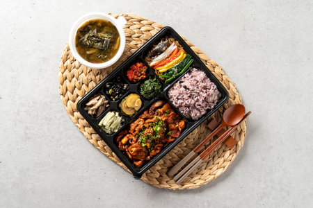 Korean food, barley oysters, stir-fried webfoot octopus, rice, side dishes, lunch boxes, abalone, ribs, steamed pork bellyの写真素材