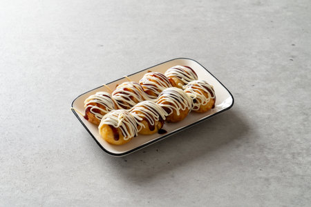 Original Takoyaki Korean food dish spicy garlic flavor Cheddar Cheese Flavorの写真素材