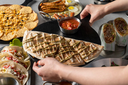 Beef pork belly, burrito, cheese, nachos, old whole chicken, fried chicken, chicken dishes, grilled squid, mussels, stewの写真素材