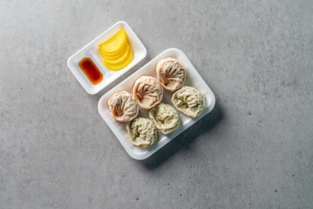 Cold noodles, bibim, cold noodles, meat, dumplings, kimchi, Yukgaejang, pickled radish, side dishesの写真素材