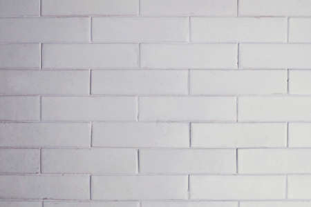 White clean ceramic brick Tile wall Texture backgroundの写真素材