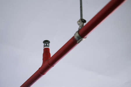 Automatic Fire Sprinkler in red water pipe Systemの写真素材