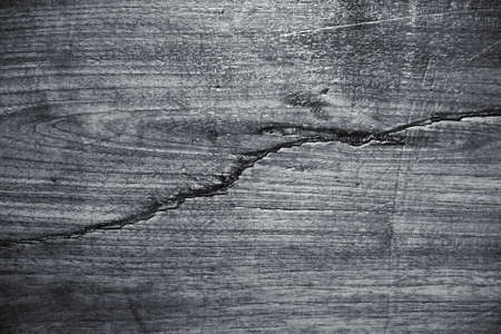 grunge black wood with big crack texture backgroundsの写真素材