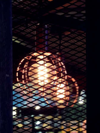 Vintage Industrial design style Expanded Metal with Edison light bulbの写真素材