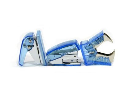 Mini office equipment,staple, paper punch and Pulling staples on white background の写真素材