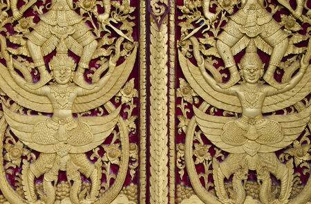 sculpture of thai temple windowの写真素材