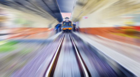 Vintage high speed train take off from station