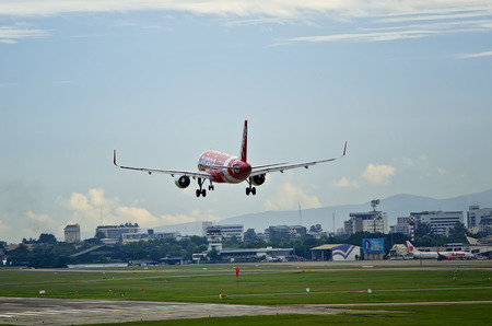 CHIANGMAI, THAILAND- AUGUST 25 2014 : HS-BBK Airbus A320-216 of Thai airasia. Landing to Chiangmai International airport , thailand.のeditorial素材