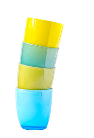 Stack of  colorful glasses on white backgroundの写真素材