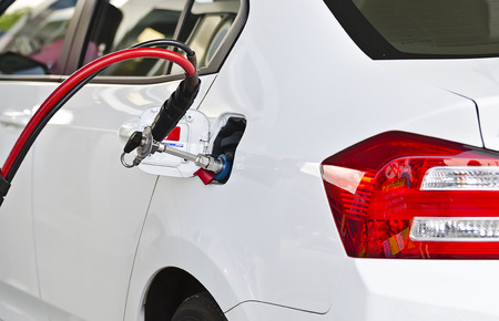 Fuel up the natural gas vehicle (NGV) at the stationのeditorial素材