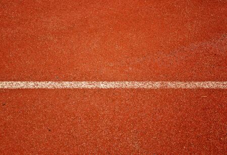 Close up running track for the athletes backgroundの写真素材